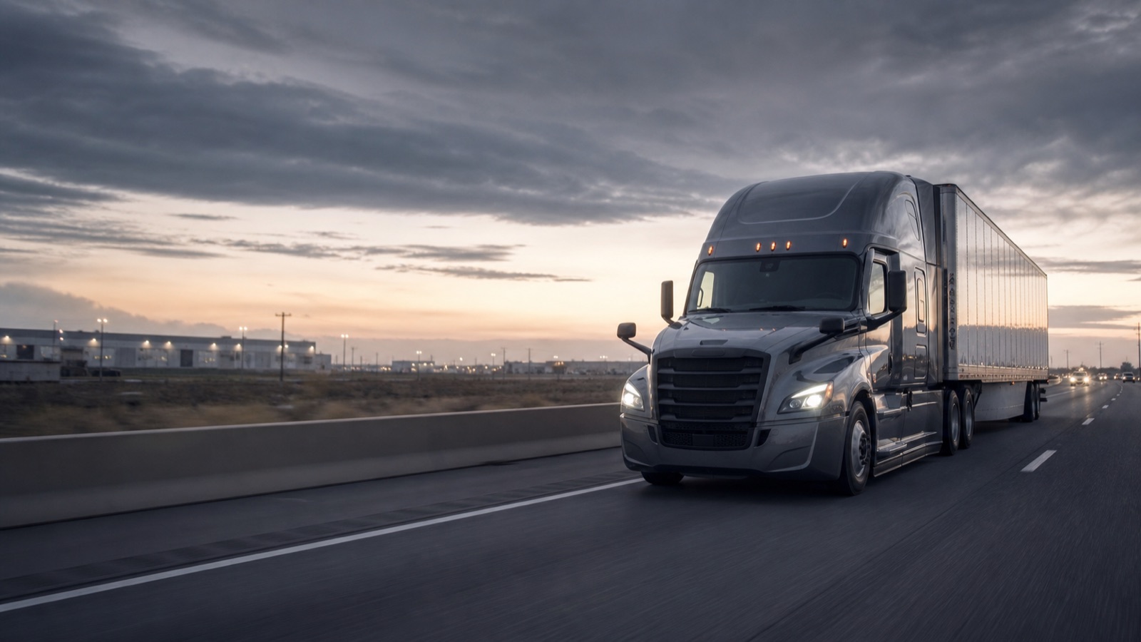 Dry van truck moving freight on a United States interstate corridor